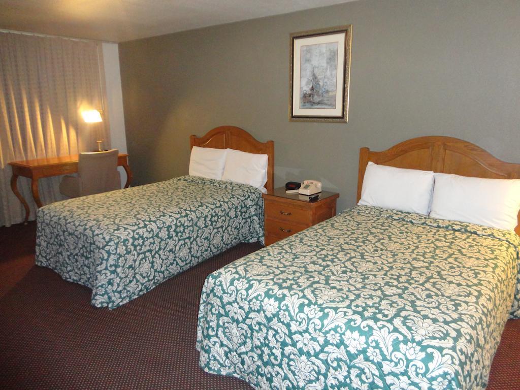 Garden Inn And Suites Silsbee חדר תמונה